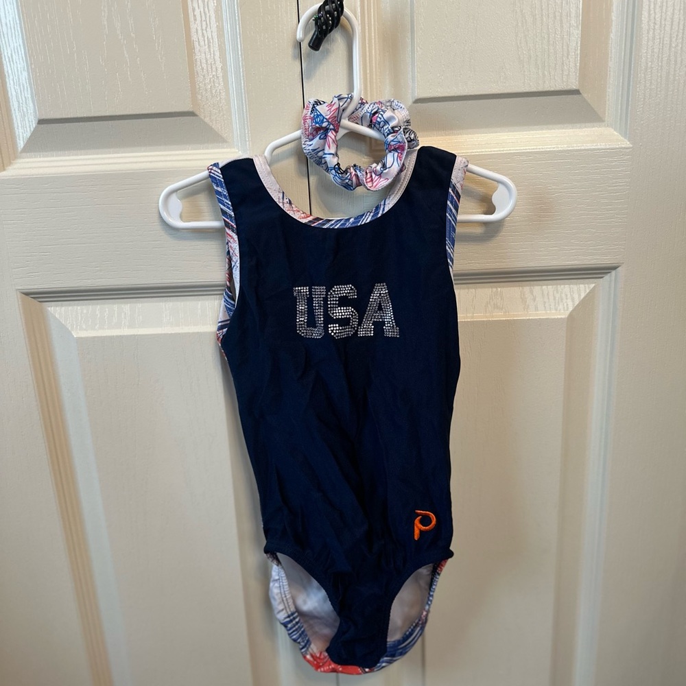 Plum gymnastic USA red white and blue Leo.Scrunchie .Used,excellent condition